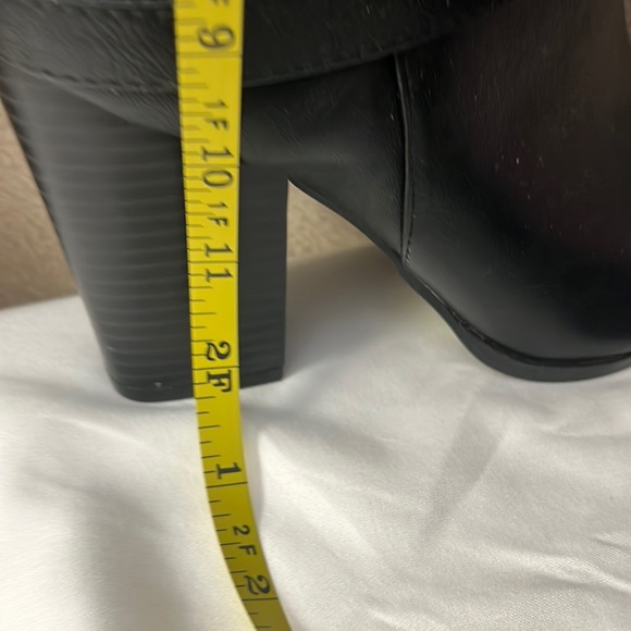 An above knee black 3 inch stacked heeled boot. - Picture 1 of 6